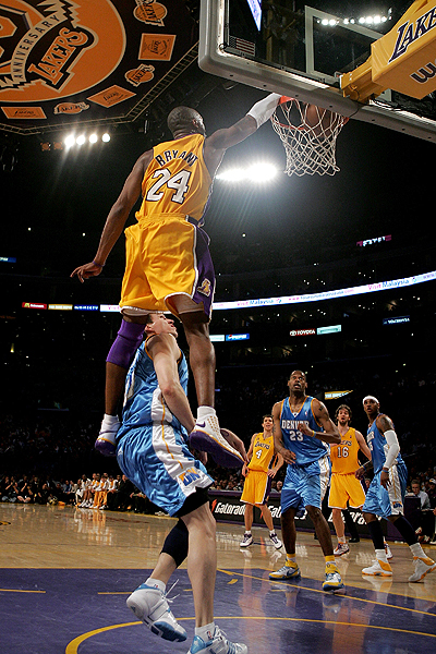 Kobe Bryant is towering above this metaphor